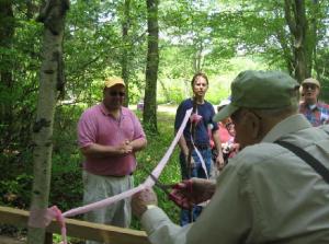 June 7, 2008 National Trails Day Ribbon Cutting Celebration - Volunteers standing in woods cutting ribbon -   at Heins Farm Conservation Area on Leadmine Road